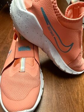 Nike Kids Coral Slip-On Sneakers with Blue Accents